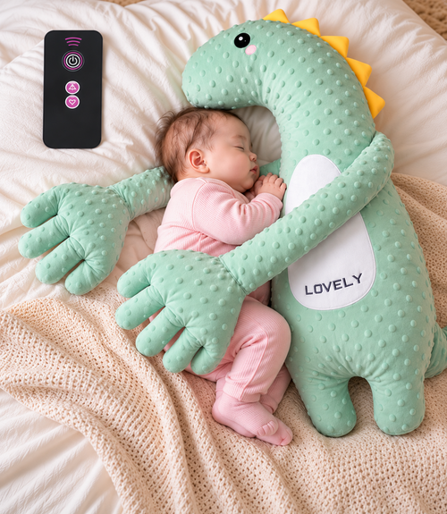 DinoAbrazo – bebé durmiendo con peluche y mando